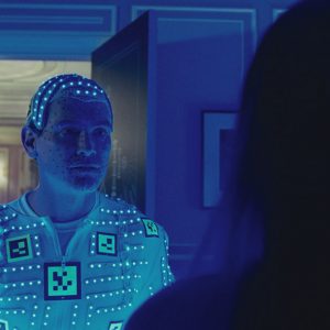 To create the Dr. Manhattan character for Zak Snyders film, Isual FX supervisor John 'D.J.' Des Jardin needed a lighting solution. Since Dr. Manhattan glows, how do you create the light from his character on the sets and other actors? The solution is a light suit for actor Billy Crudup, with over 2500 blue LED's and digital tracking markers